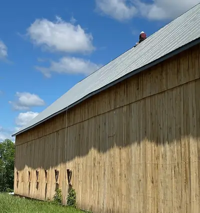 Installation of Lightning Rods on Barns